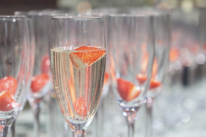 Glass of cava with strawberry